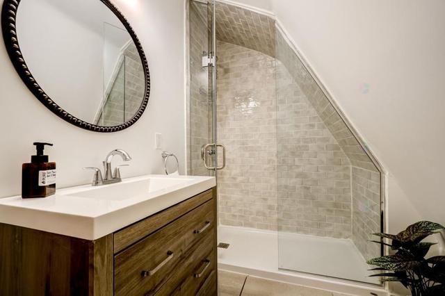 Bathroom vanity with round mirror