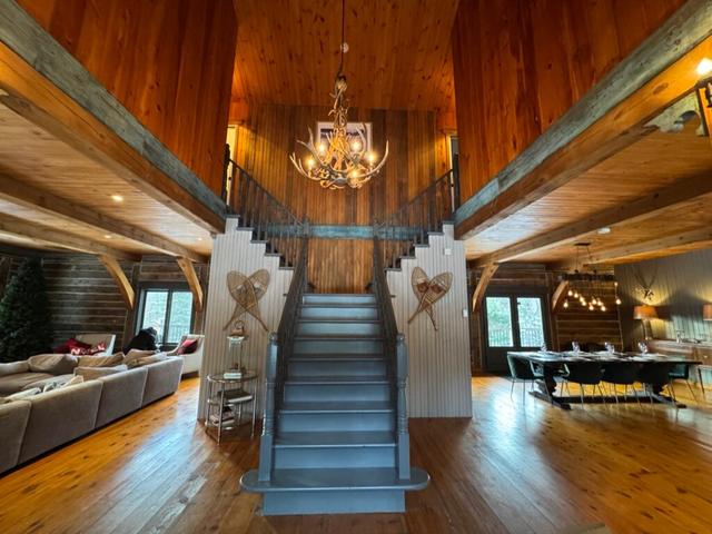The open staircase and mezzanine seen from the great room