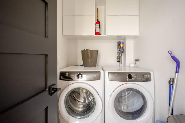 Laundry room with washer and dryer