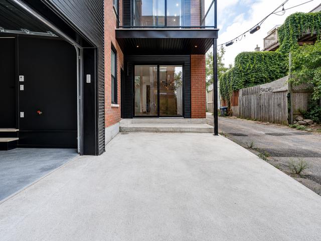 The private parking spot at the rear entrance